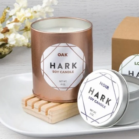 Glossy labels on candle container and candle lid