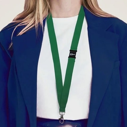 Lanyard with identification tag hanging from the woman's neck