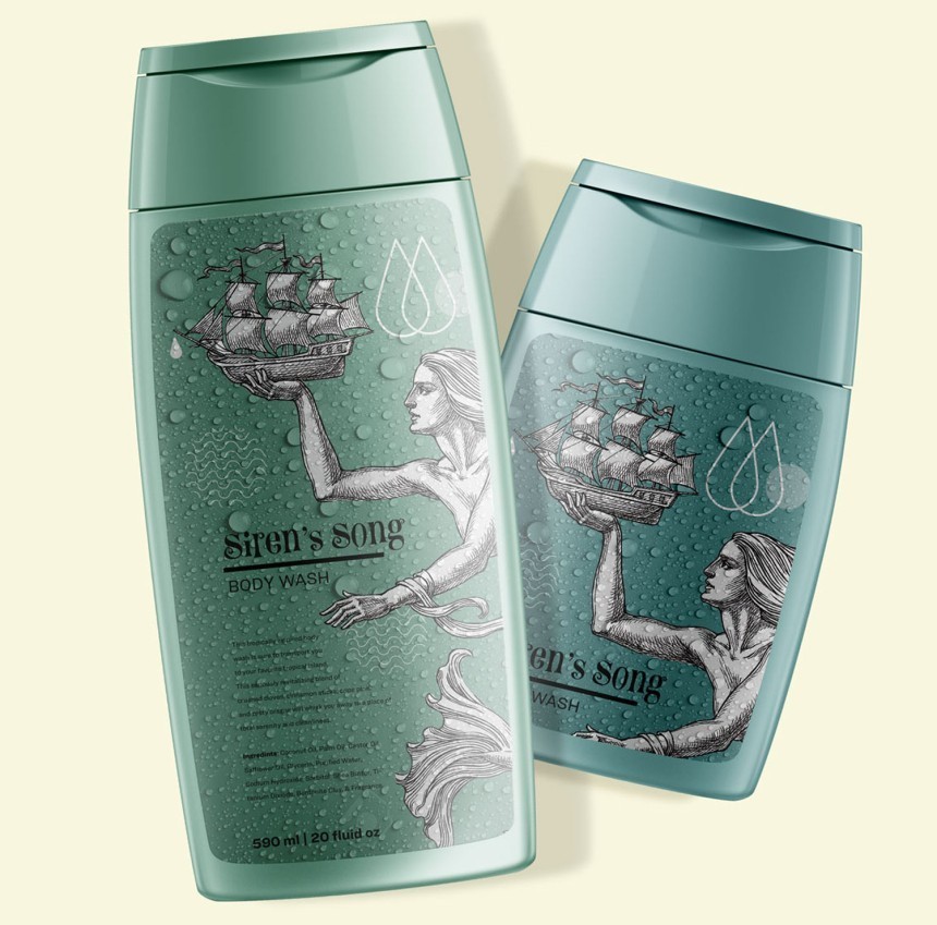 Two greenish bottles of “Siren’s Song” shower gel. The label features a mermaid illustrated in a style reminiscent of an old copperplate engraving, holding a sailing ship above her head. The background of the label has a water-drop pattern.