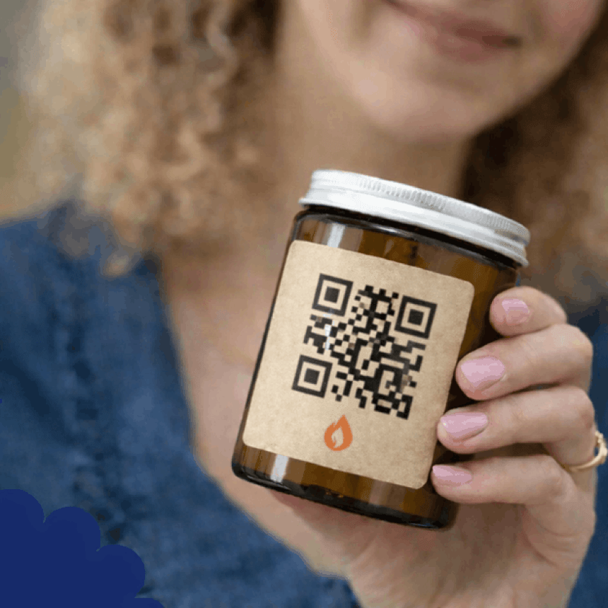 A woman's hand holds a brown jar with a label featuring a large QR code, which allows access to additional product information.